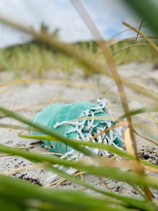 green lightweight and sandfree beach towel 